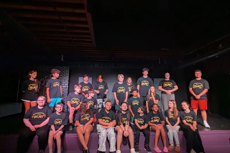 The summer 2026 company in their Phoenix Collective shirts