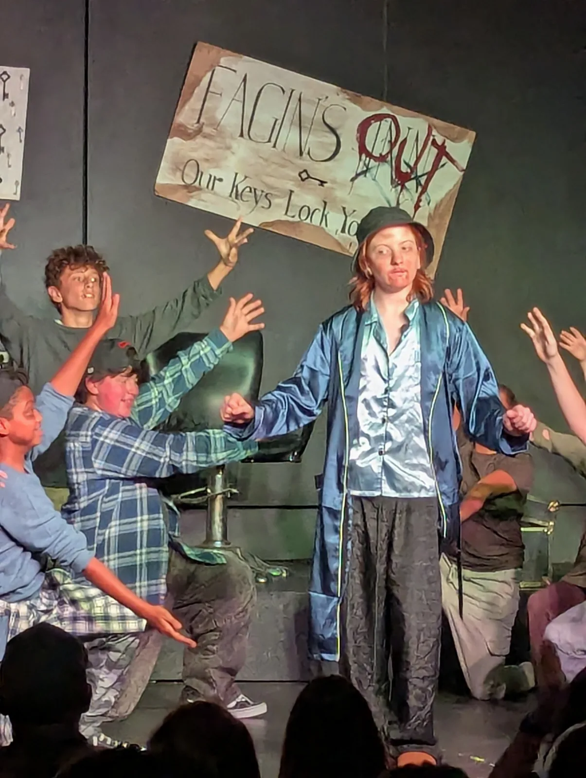 The cast of Oliver! The Musical on stage at The Arctic Playhouse, August 2026