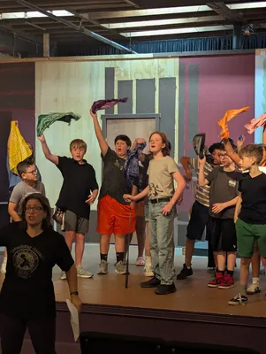 Students working together in a movement game