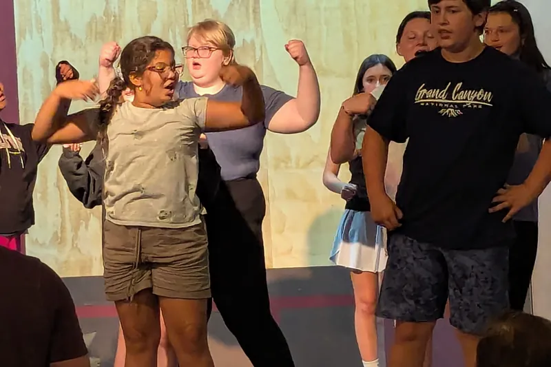 Students improvising a scene together in a summer workshop